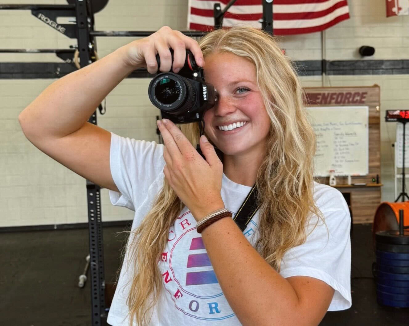Casey our gym photographer all smiles behind the camera.