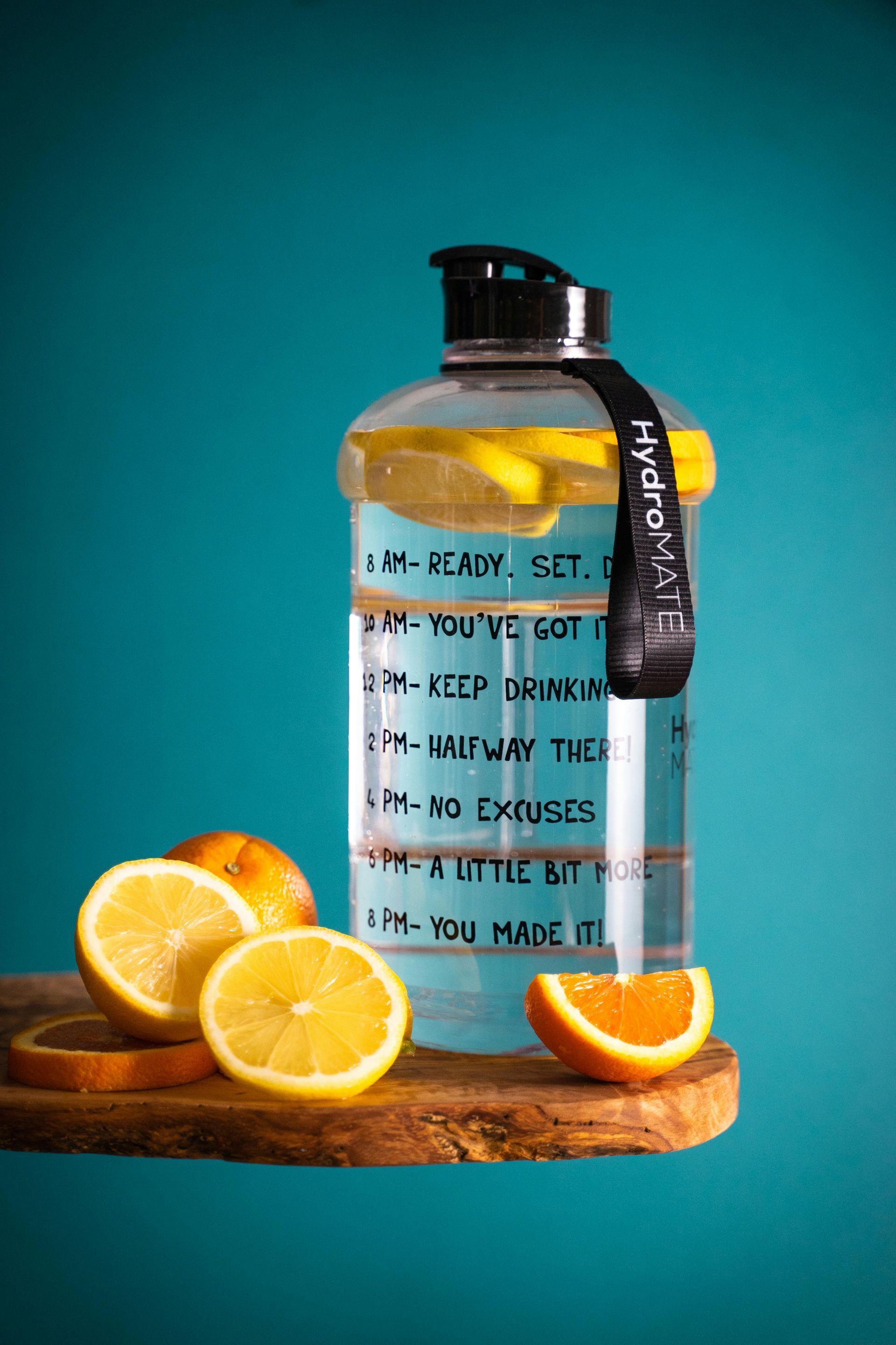 DrinLarge water bottle and citrus fruit