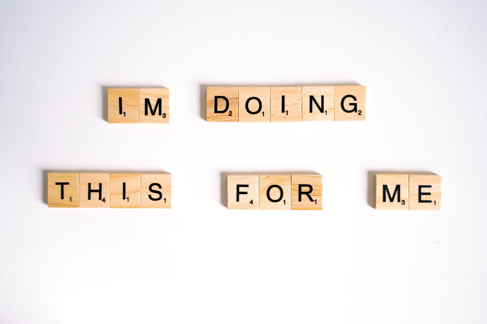 I'm doing this for me written out in scrabble tiles