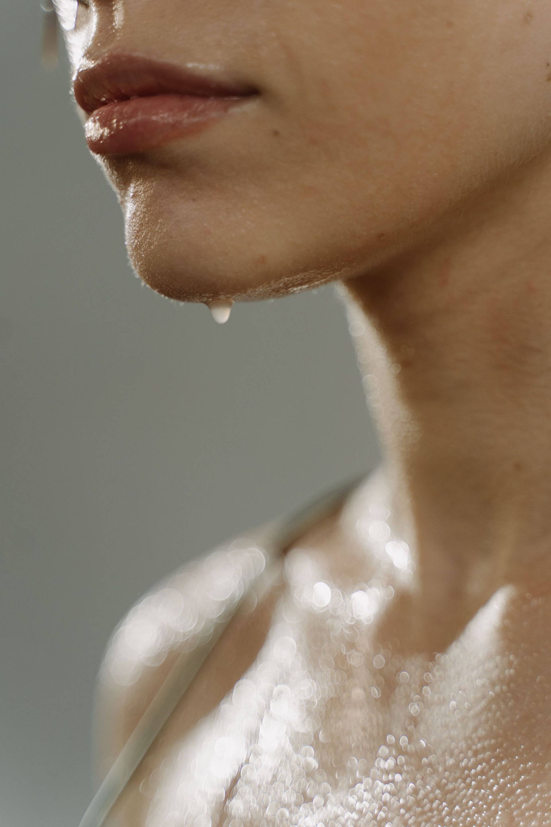 Drip of sweat rolling off a chin