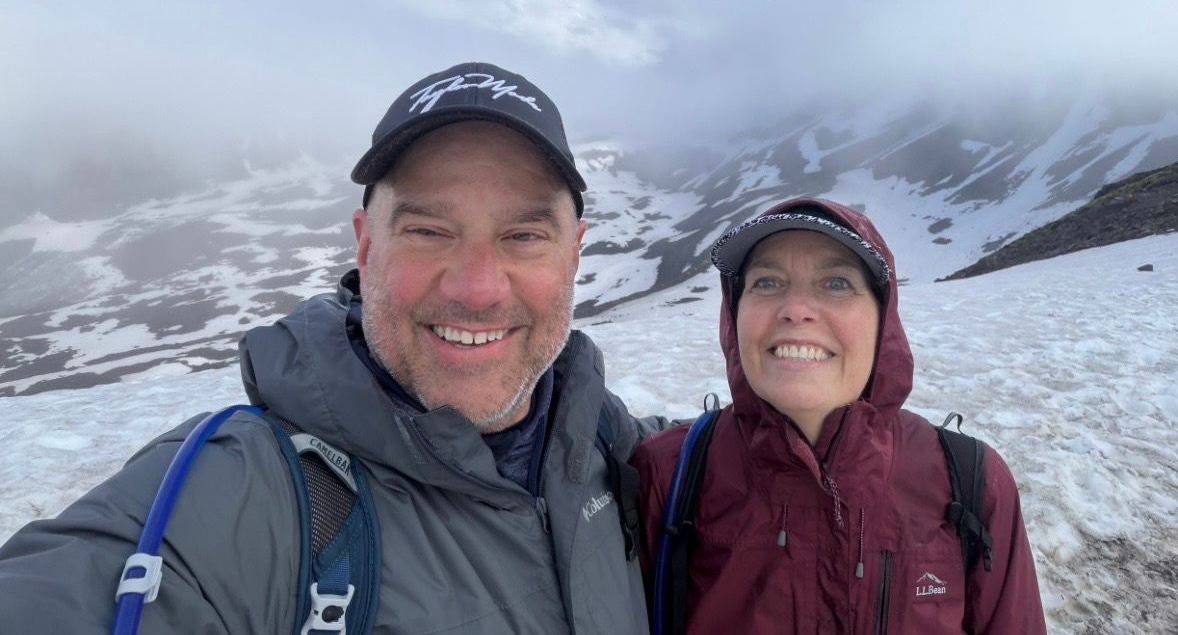 Scott and his wife on a swnowy hike