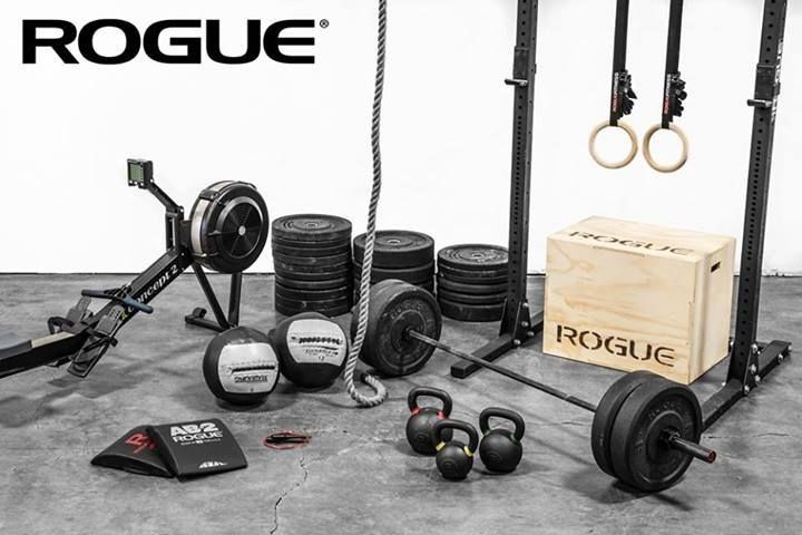 There are many different types of exercise equipment on the floor.