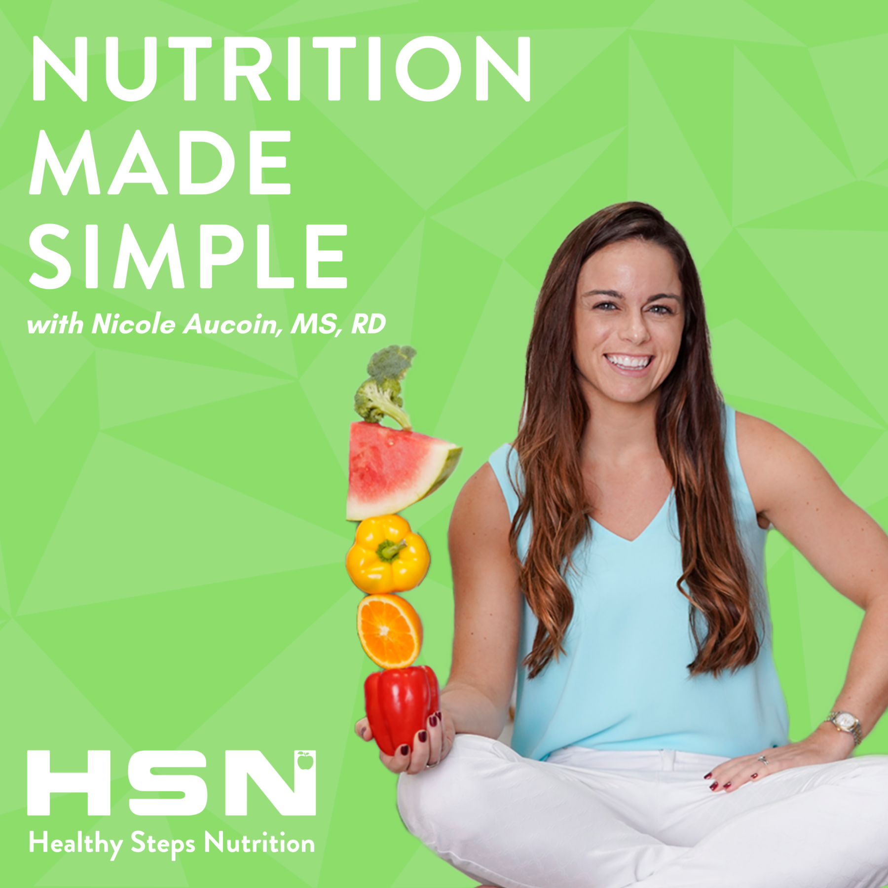 A woman is sitting in a lotus position holding a red pepper.