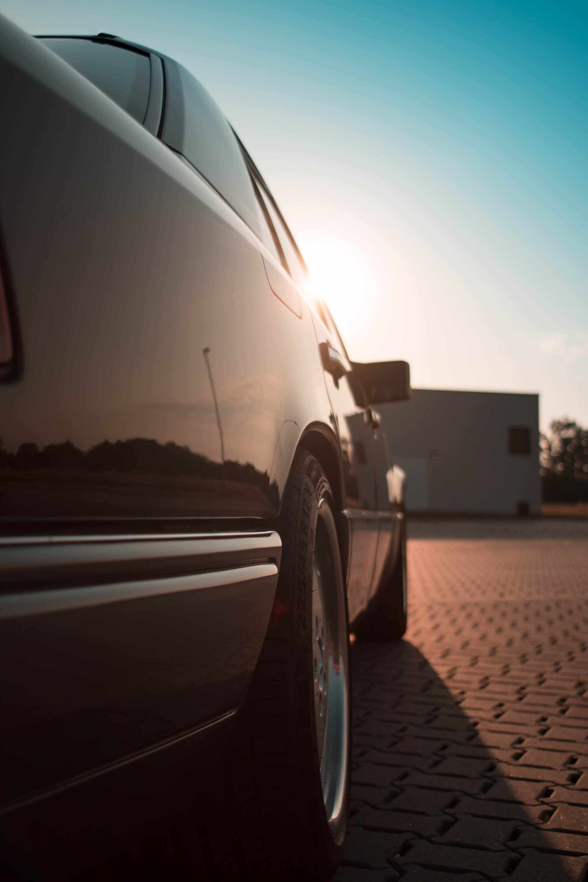 shiny black side panel of a car