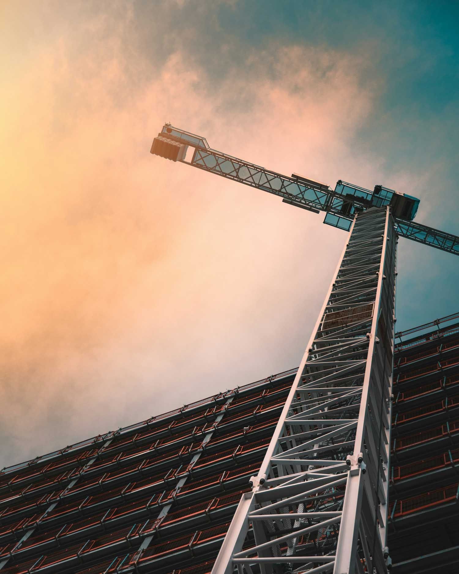 Construction crane next to a building