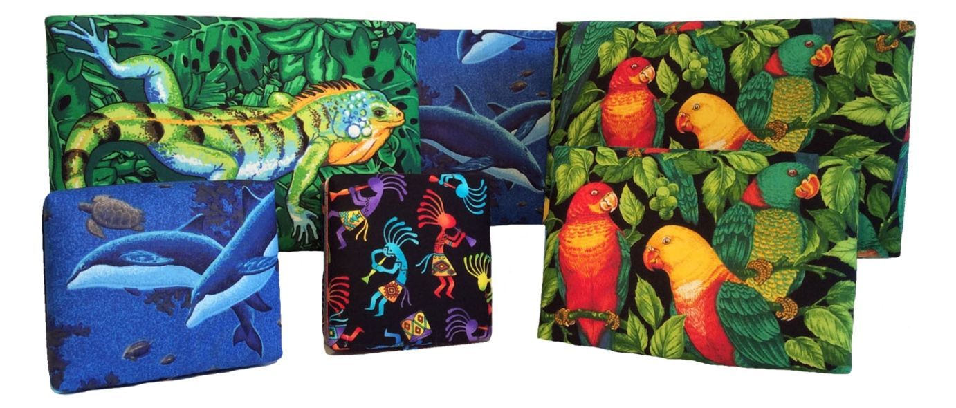 A bunch of paintings with dolphins and birds on them
