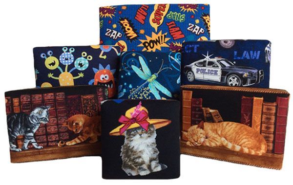 A group of wallets with cats and a police car on them