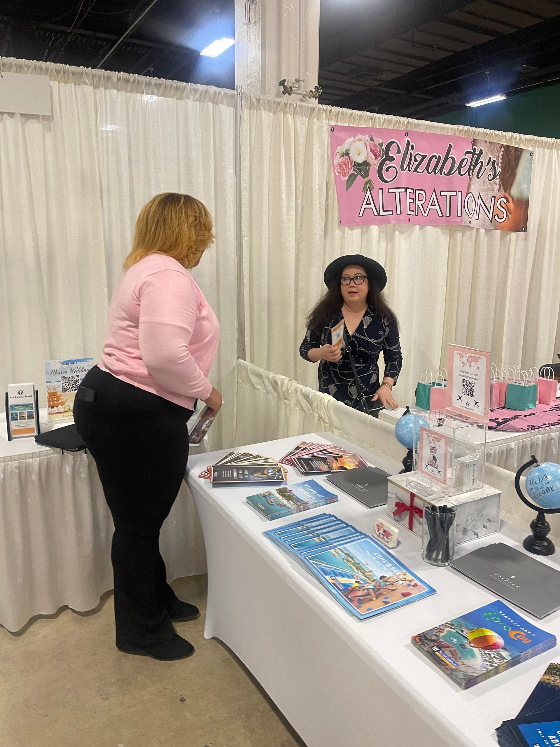 Lex Luxury Travel team networking with local businesses at a community event