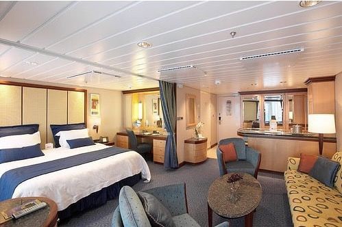 Suite-style cruise cabin with living space available for Super Cruise 2026