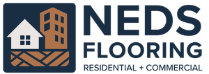 The logo for ned 's flooring shows a city skyline with houses on the roofs.