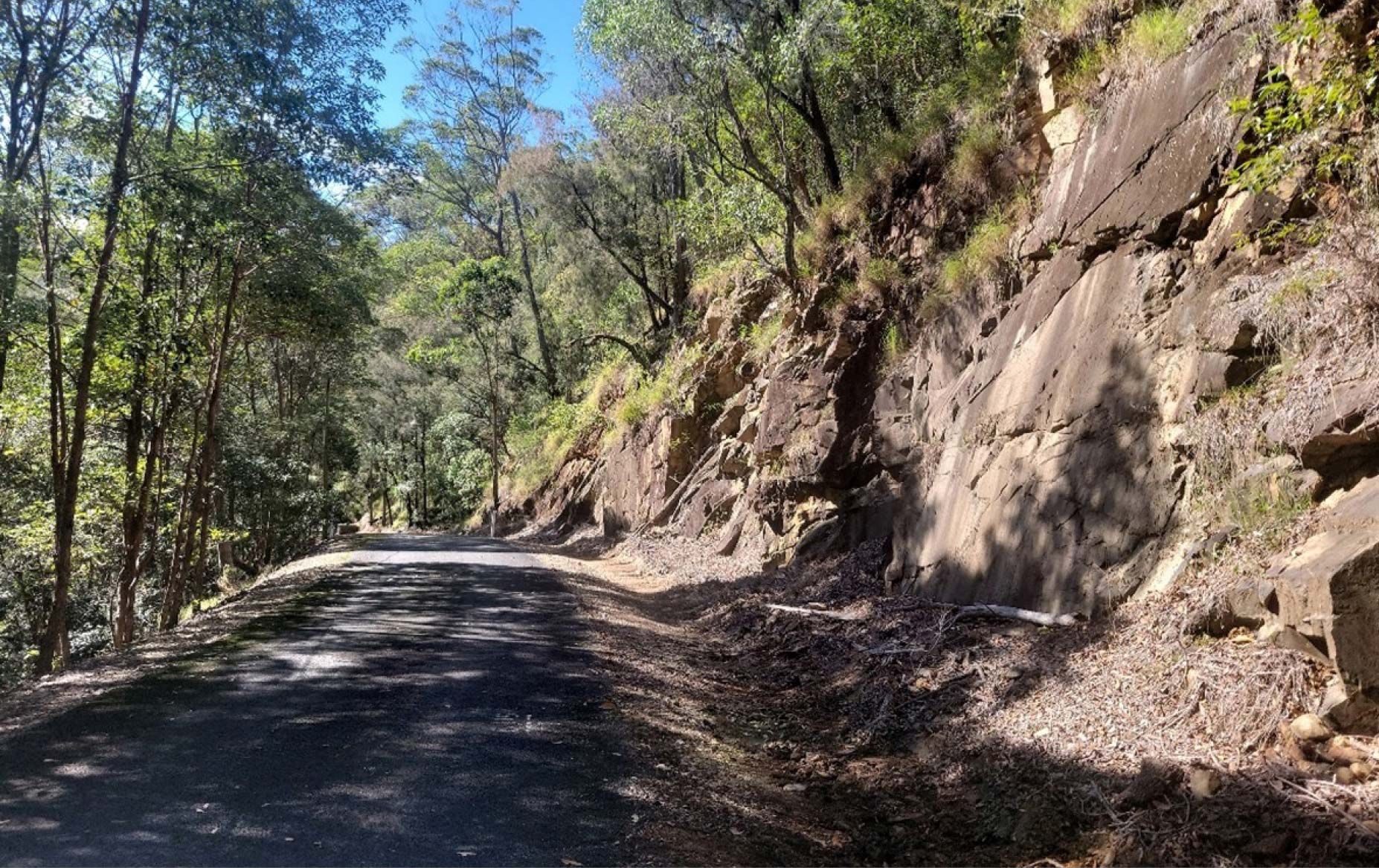 Redleaf Group was engaged by GHD to deliver a comprehensive cultural heritage and native title assessment for upgrades and remediation works at Little Nerang Dam Road, Springbrook. The project area encompassed significant public infrastructure and landscape, requiring heritage protection and statutory compliance. The review included a desktop assessment of historic and archaeological registers, detailed field survey, heritage risk analysis, and procedural advice to ensure works met obligations under the Aboriginal Cultural Heritage Act 2003, Queensland Heritage Act 1992, and Native Title Act 1993. Recommendations prioritised heritage protection alongside public benefit, outlining consultation and documentation protocols for both Aboriginal and non-Indigenous values.