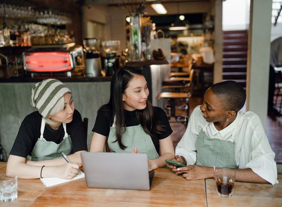 Restaurant leaders reviewing multi-unit operations