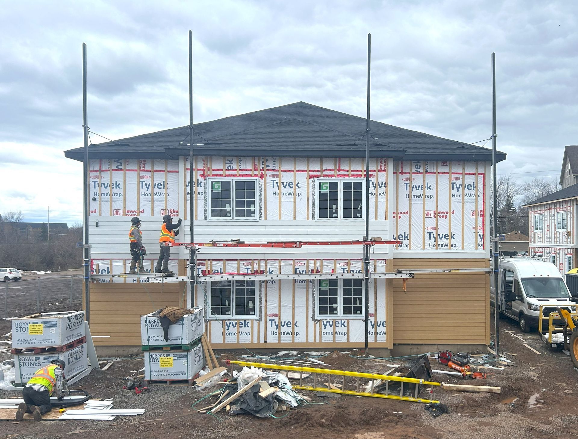 complete multifamily building, siding installation