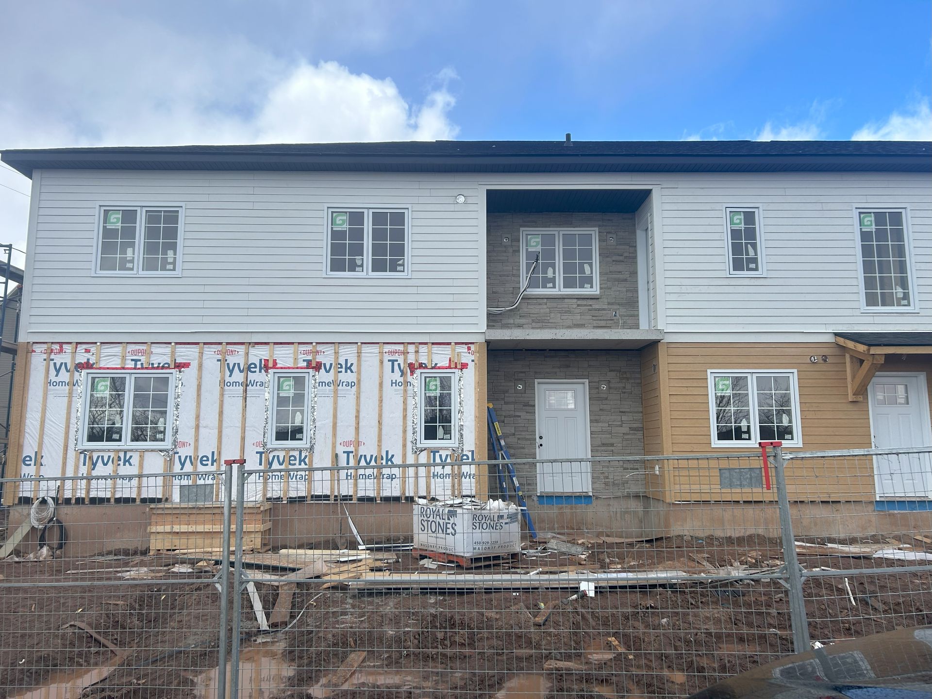 complete multifamily building, siding installation