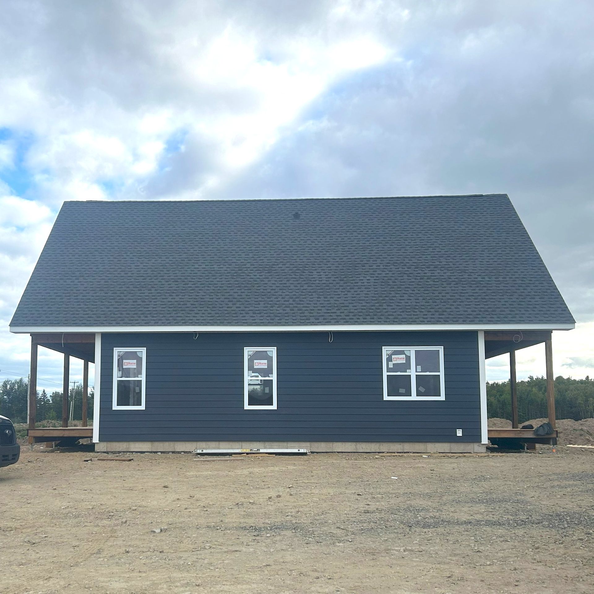 framing and siding of house  and garage