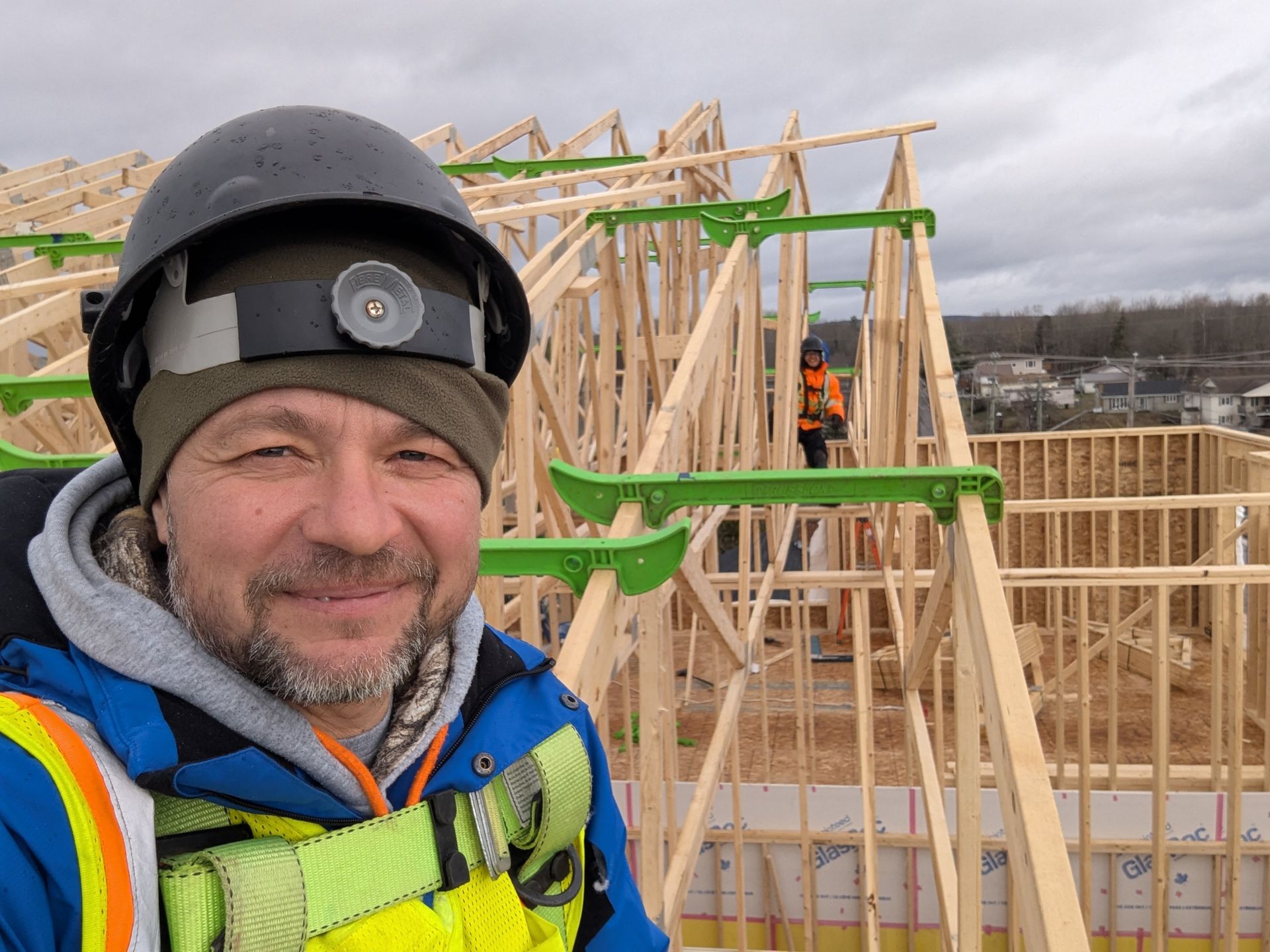 team member from the top of framing project