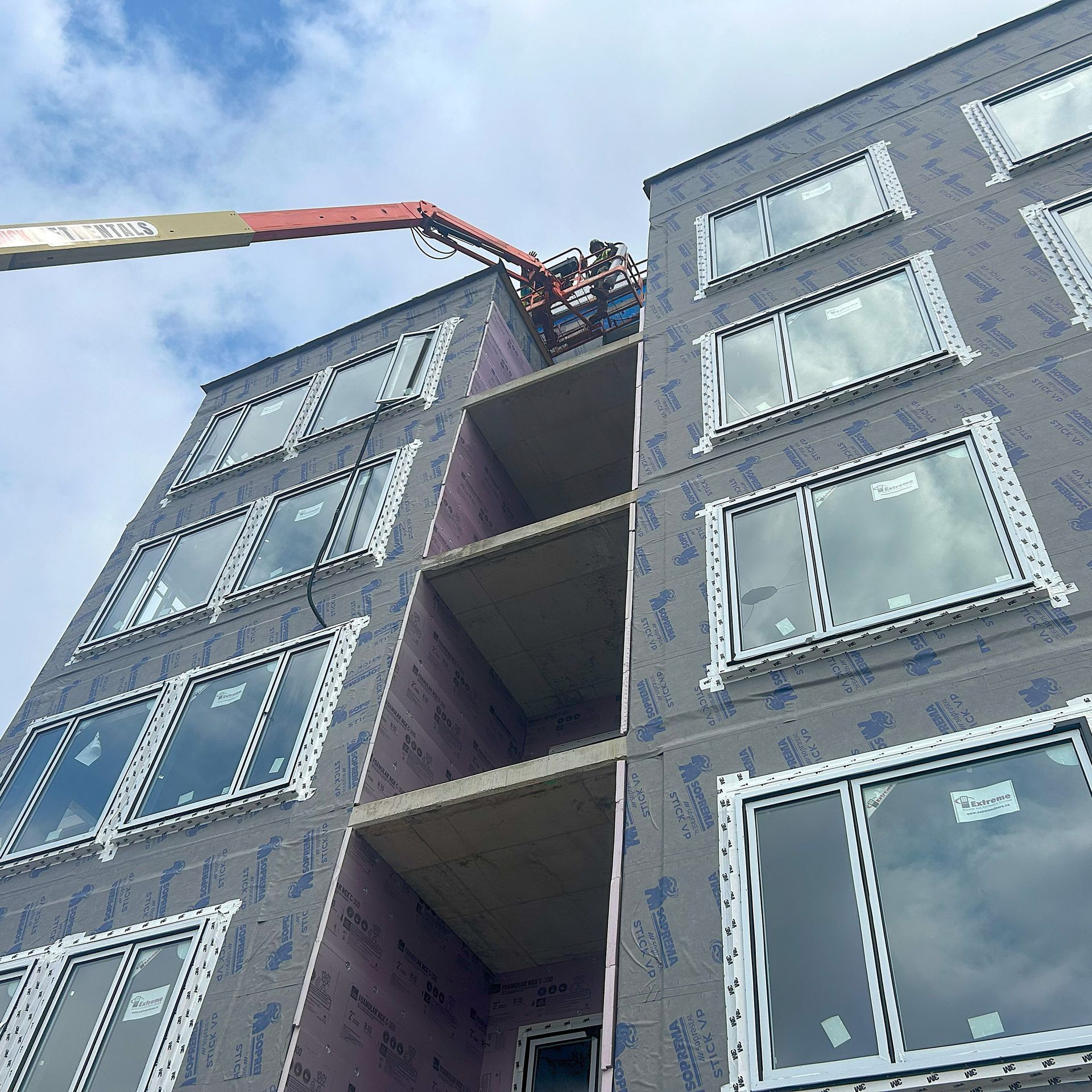 Siding installation in champlain building