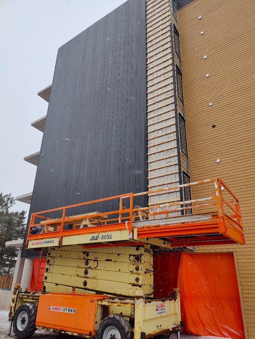 Siding installation in champlain building