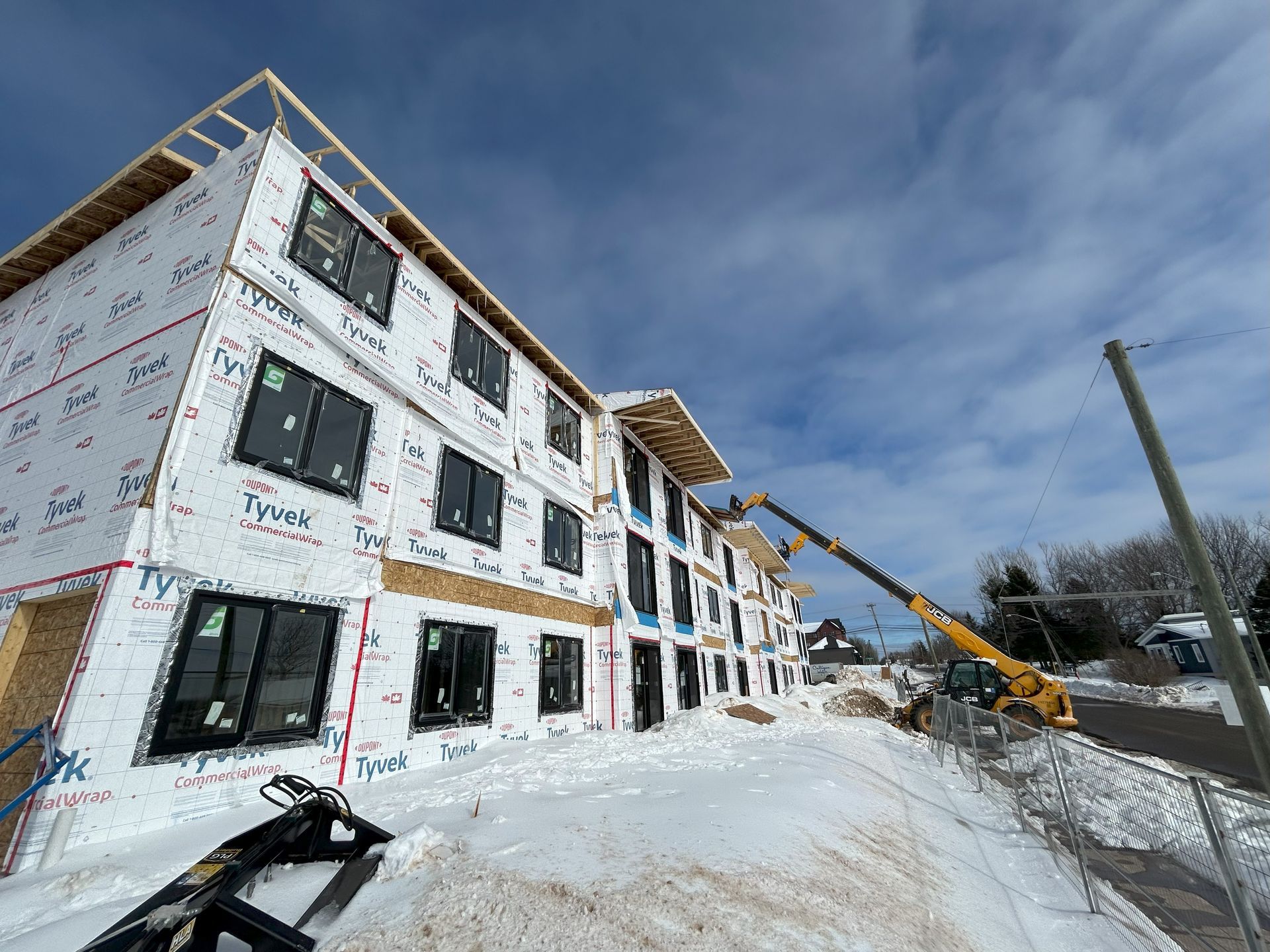 framing a multifamily building, window installation