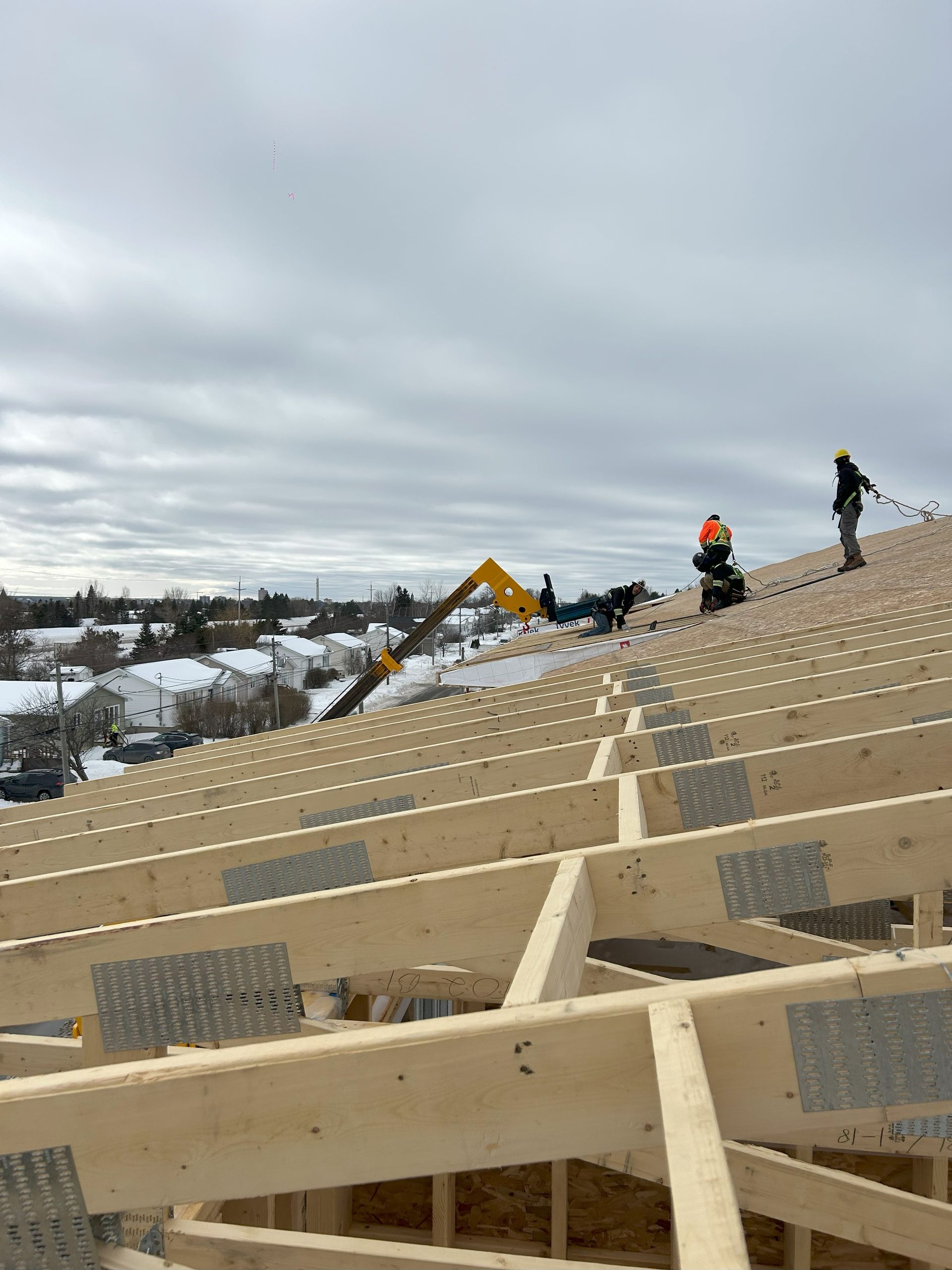 framing a multifamily building, roof work