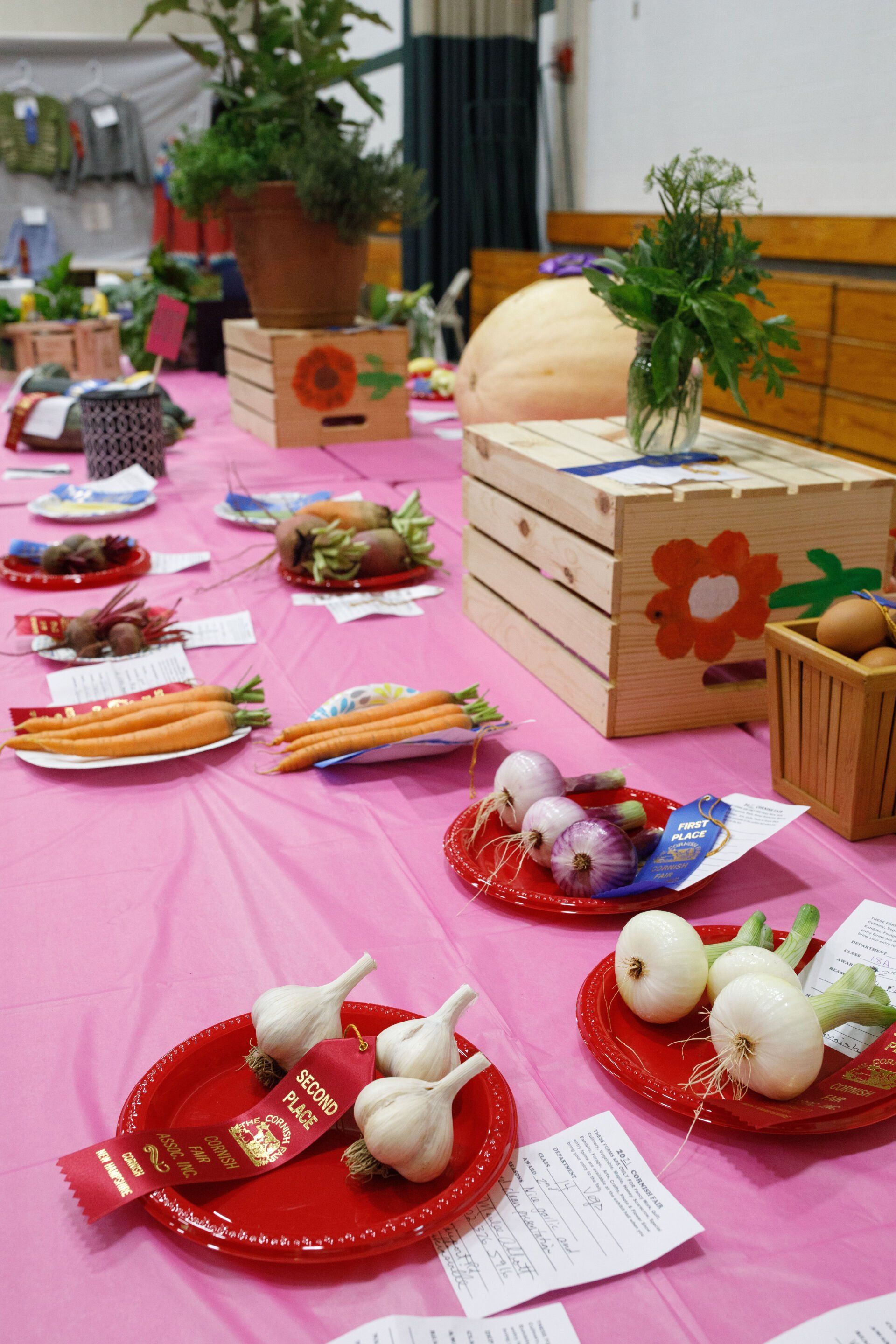 A table with plates of vegetables on it
