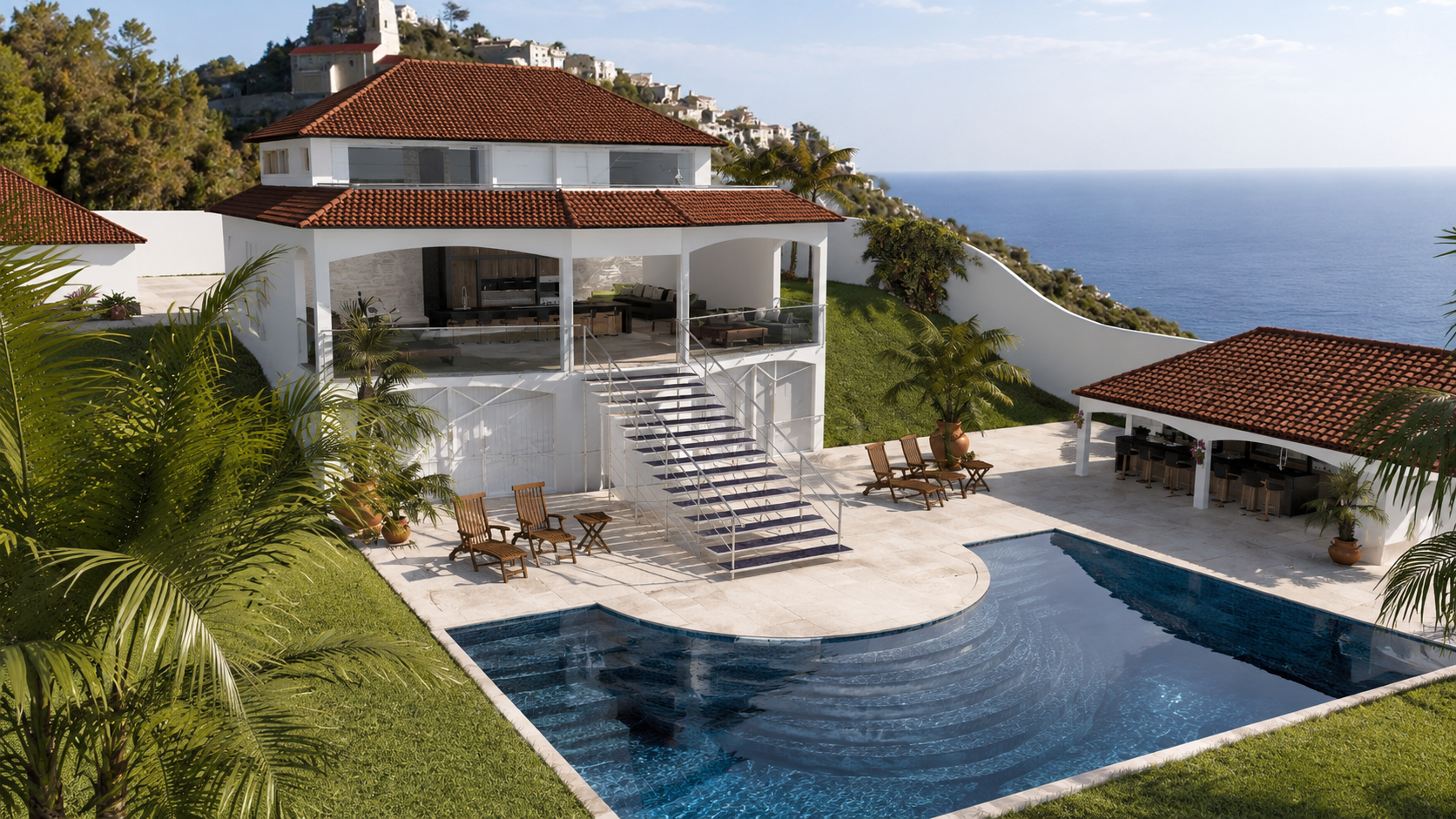 Luxury villa with red roofs, ocean view, and a blue swimming pool surrounded by a green hillside garden