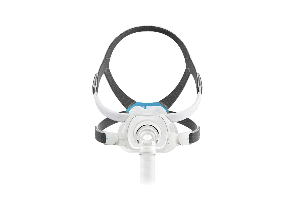 A white and blue cpap mask with a head strap on a white background A white and blue cpap mask with a head strap on a white background