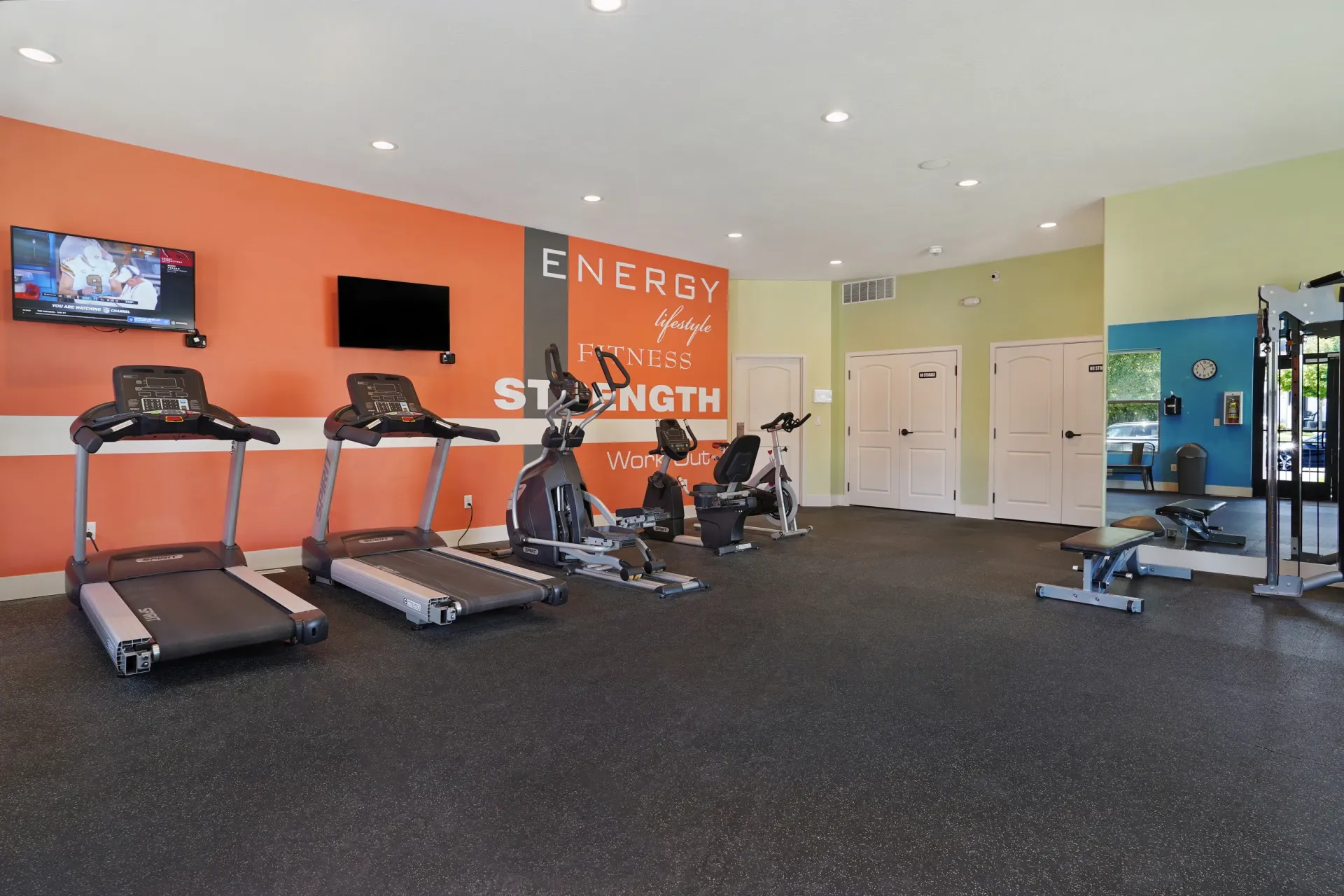 Fitness center with treadmills, elliptical, and stationary bikes at Mountain View Townhomes, offering townhomes in Ogden, UT.