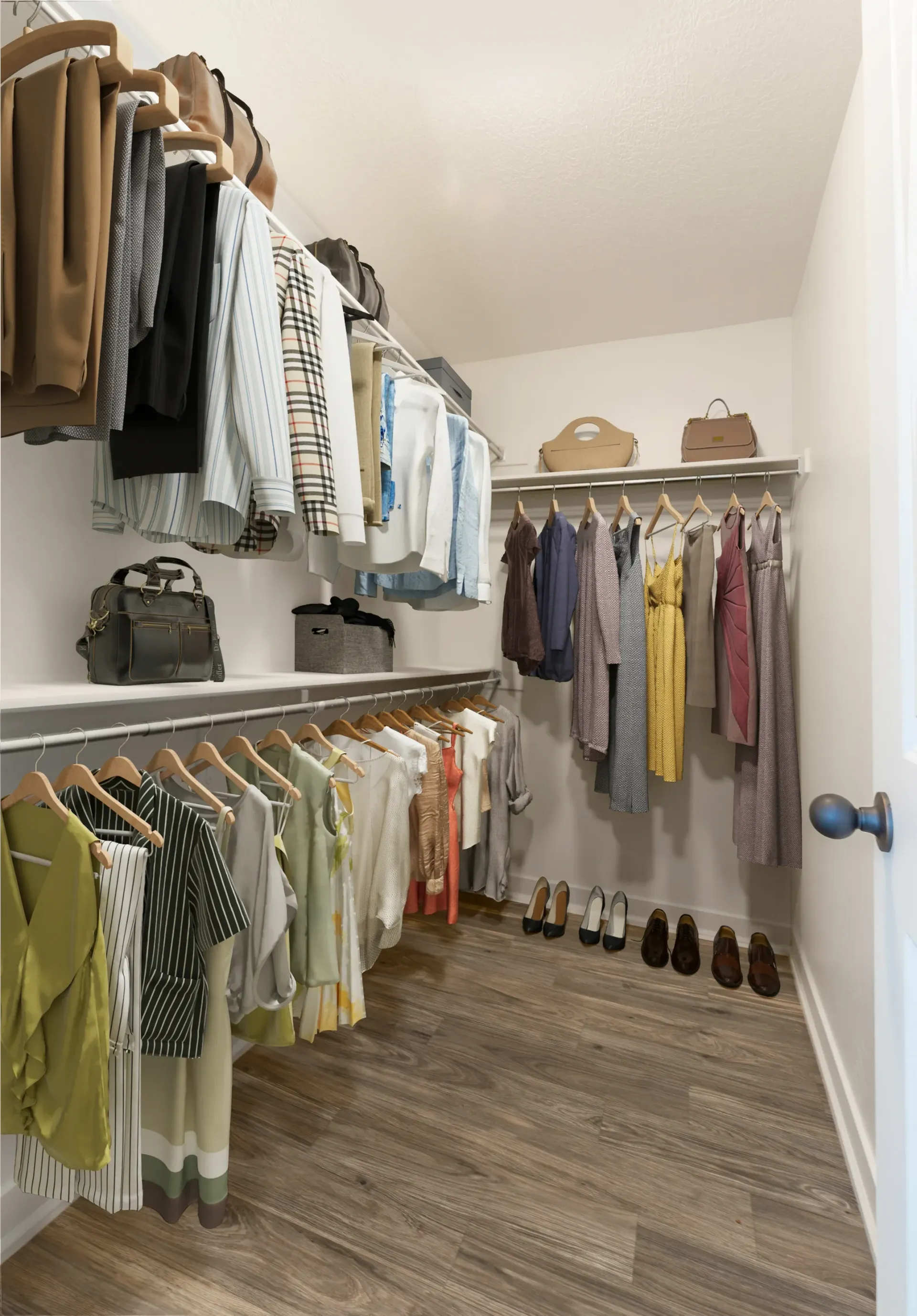 Walk-in closet with organized clothing and shoes at Mountain View Townhomes, offering townhomes for rent in Ogden, UT.