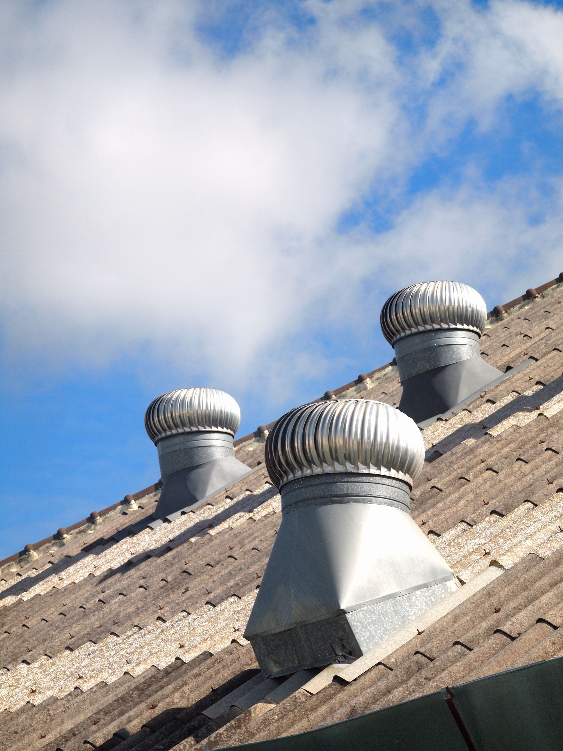 A roof with a lot of vents on it