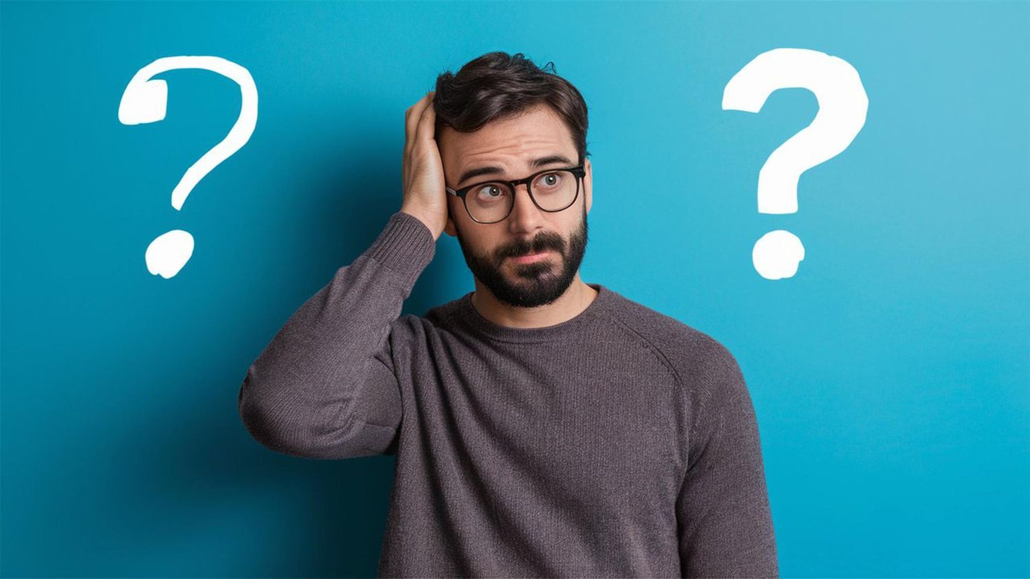 Confused man with glasses scratching his head against a blue background, with two question marks around him