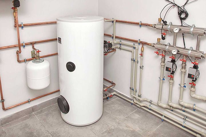 The boiler room with a lot of different equipment as a boiler