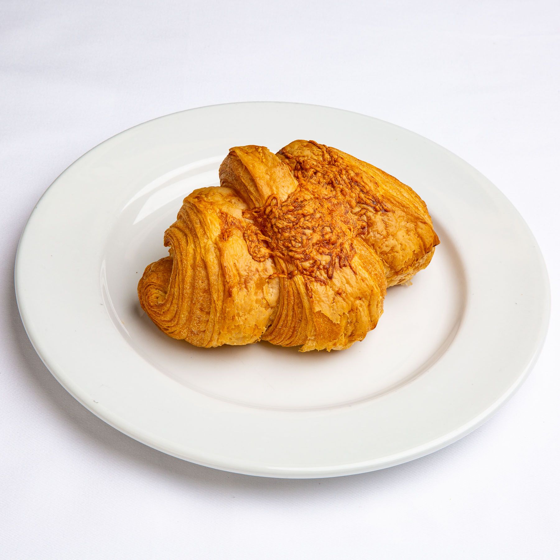 A Ham & Cheese Croissant with Coffee