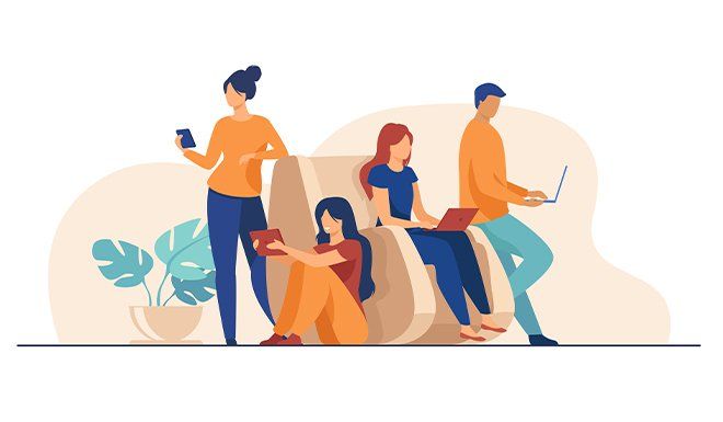 a group of people are sitting on a couch looking at their phones and laptops .