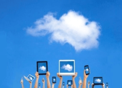 a group of people holding up their phones and tablets with a cloud in the sky