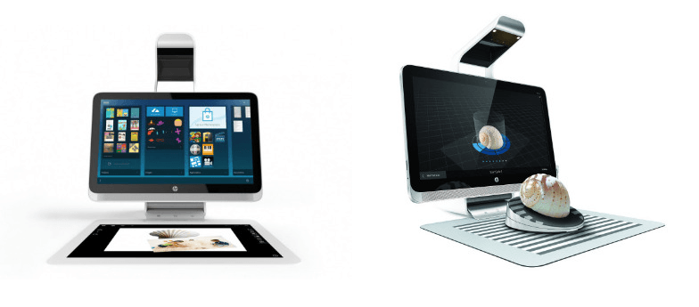 a computer monitor with a mouse on top of it