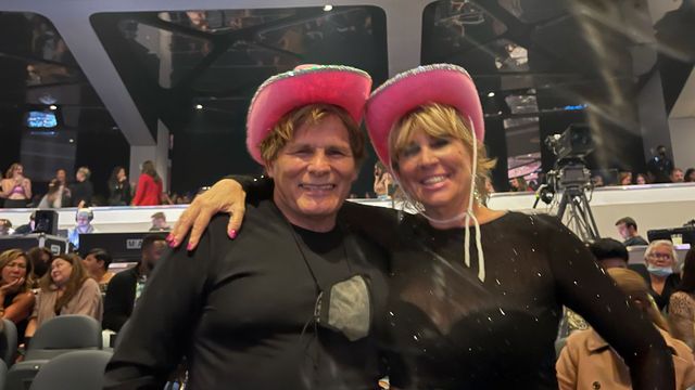 Mike Ross and Barbara J. Ross in pink cowboy hats at an Ava Max concert