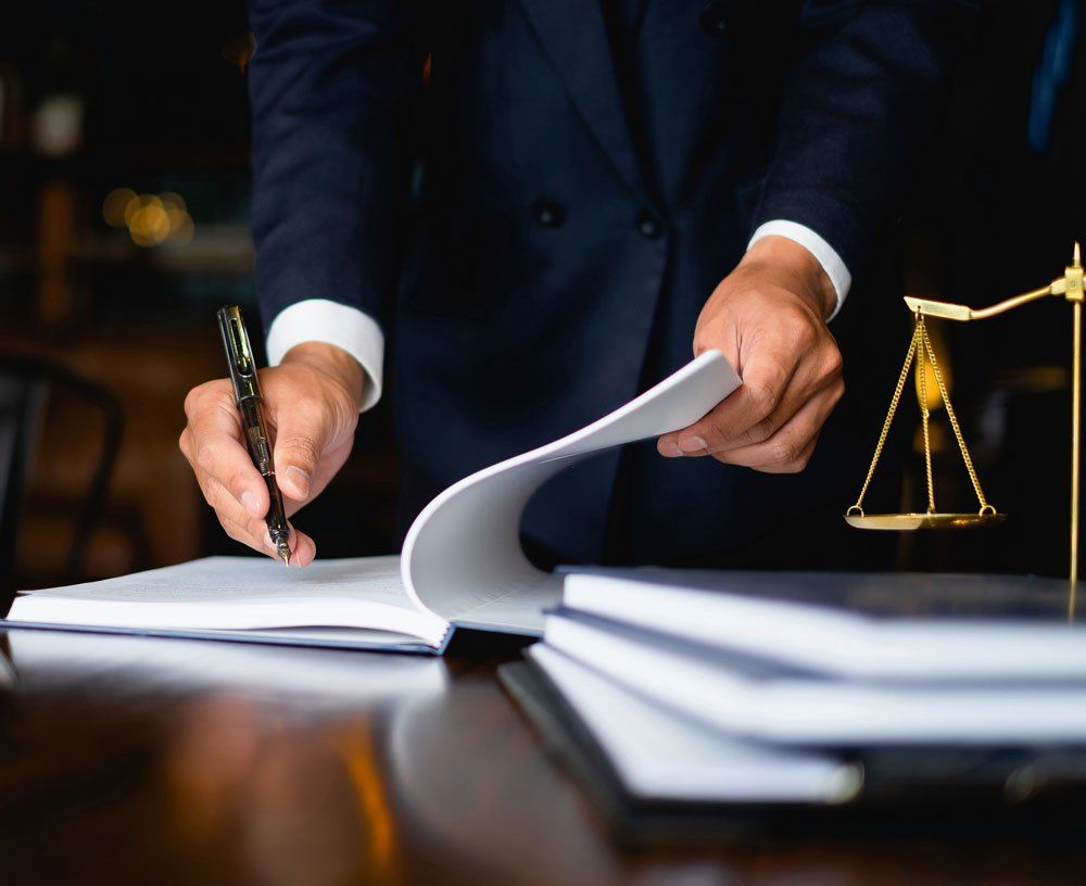 Lawyer Signing Documents — Winchester, VA — Scully & Glass