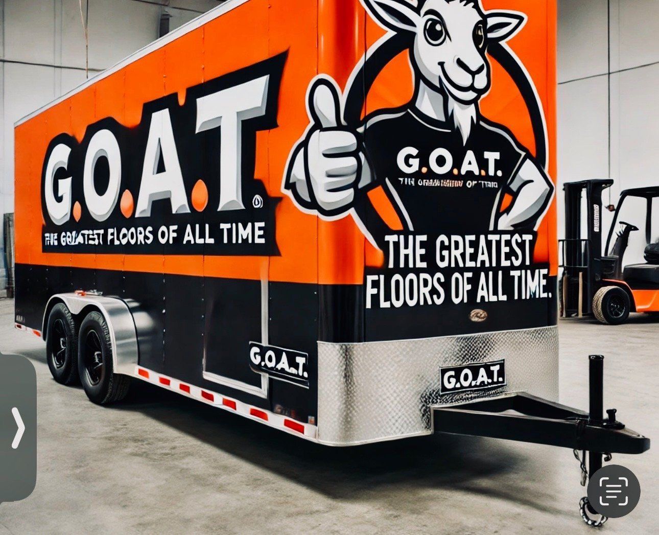 Orange and black GOAT trailer with a cartoon goat logo and “Greatest Floors of All Time” text