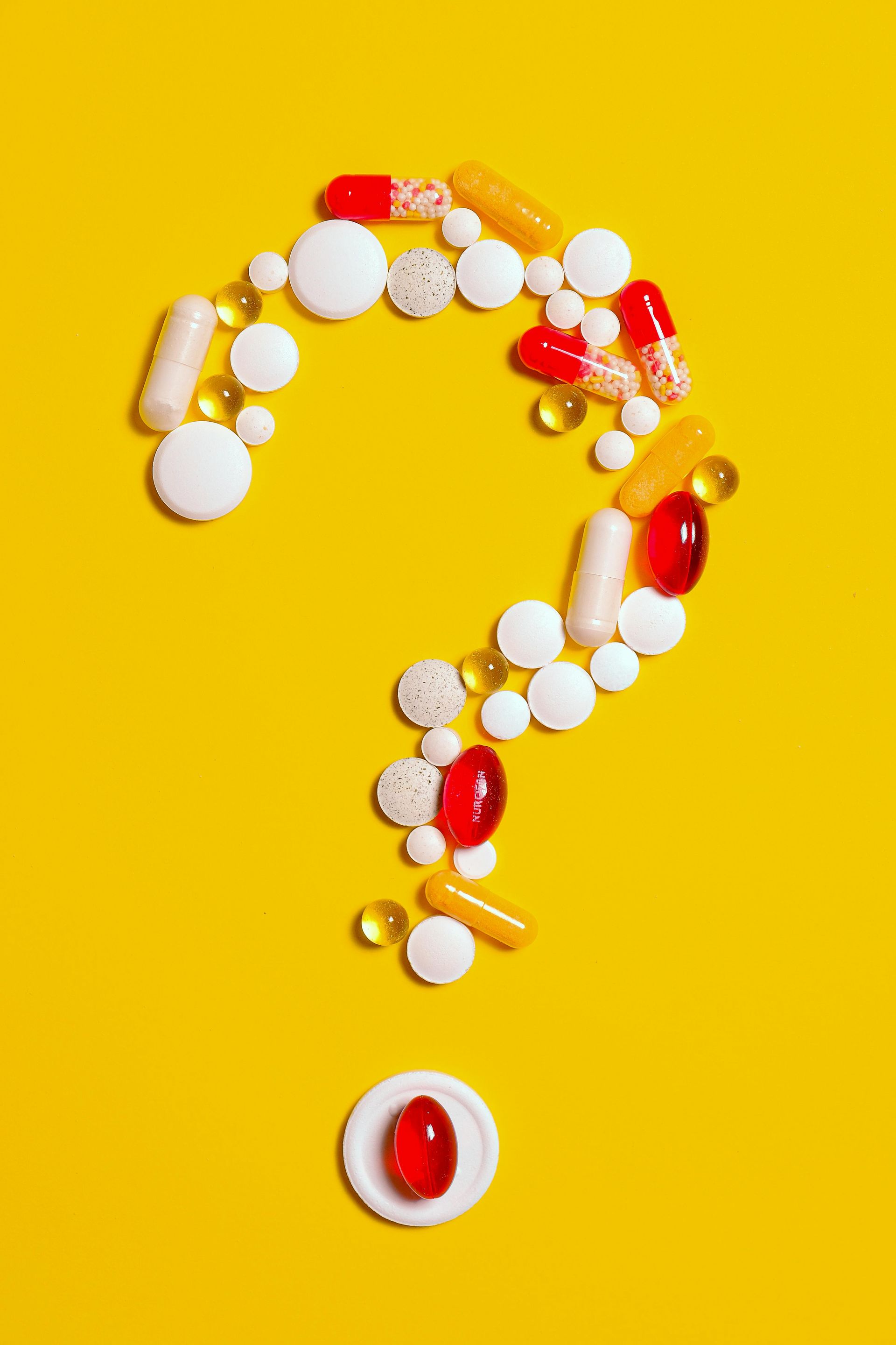 question mark out of pills