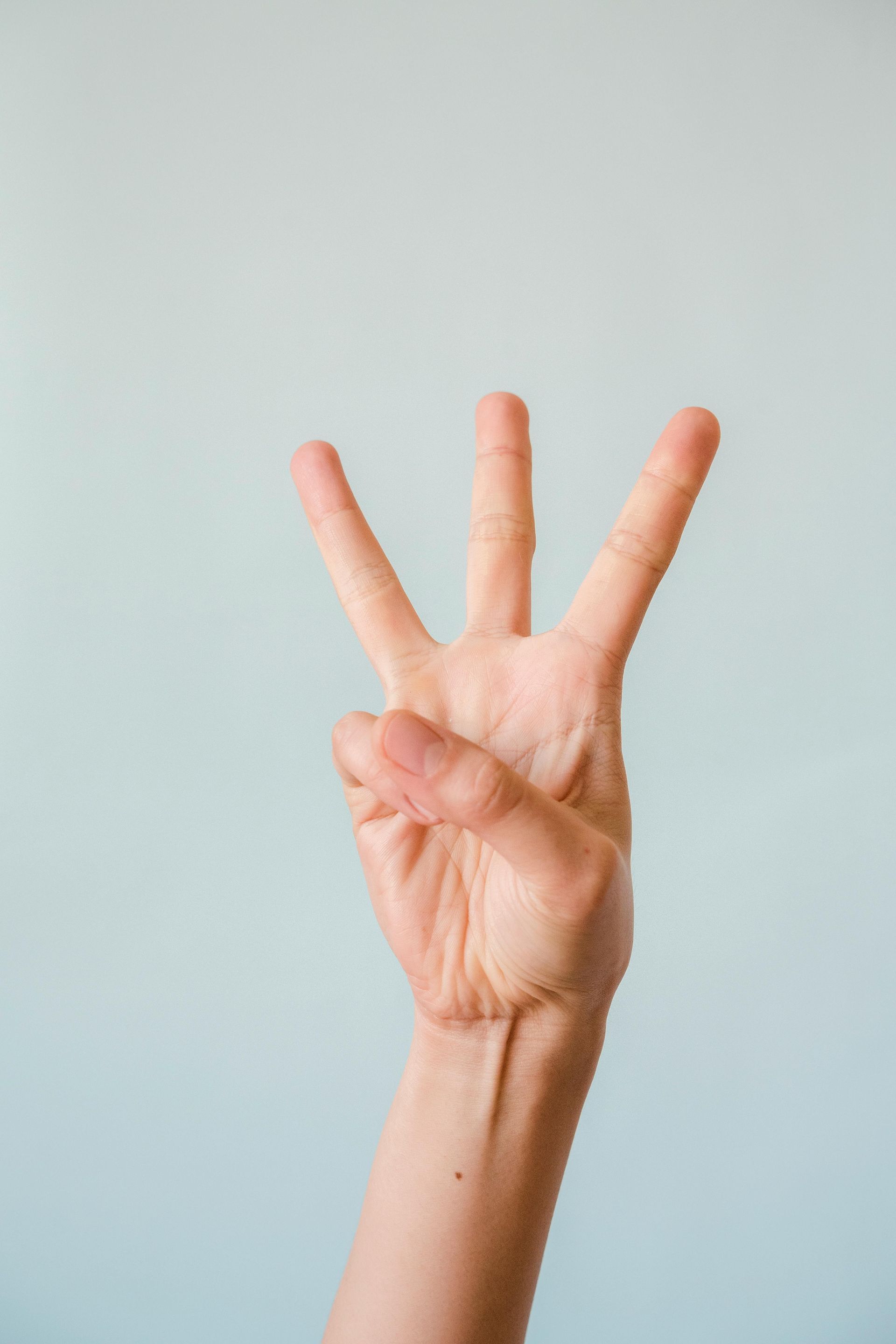 three fingers held up