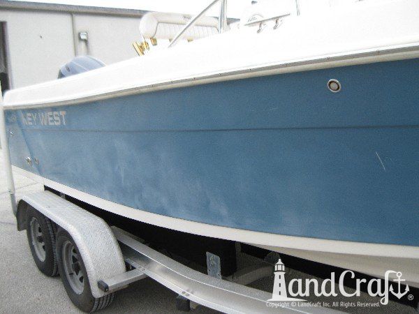 Key West fiberglass boat with faded and chalky exterior finish
