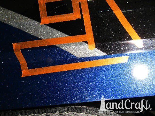 Fiberglass Lund boat with metalflake gelcoat damage