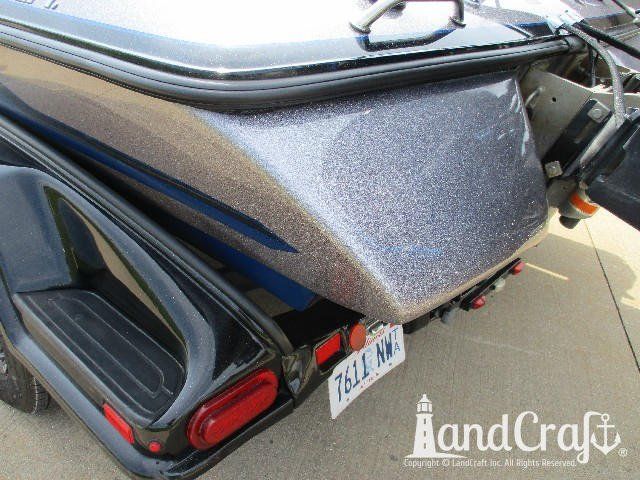 Skeeter boat that has has fiberglass and metalflake gelcoat repaired
