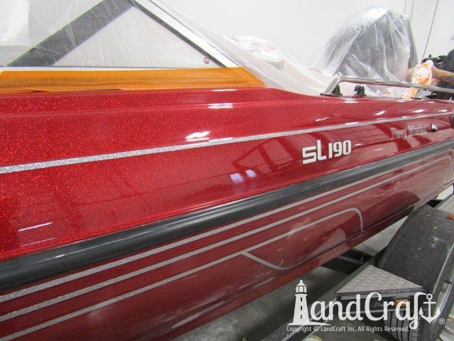 Skeeter boat with scratches repaired and a glossy metal flake finish