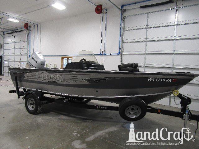 Picture of aluminum Lund boat after repair and refinishing