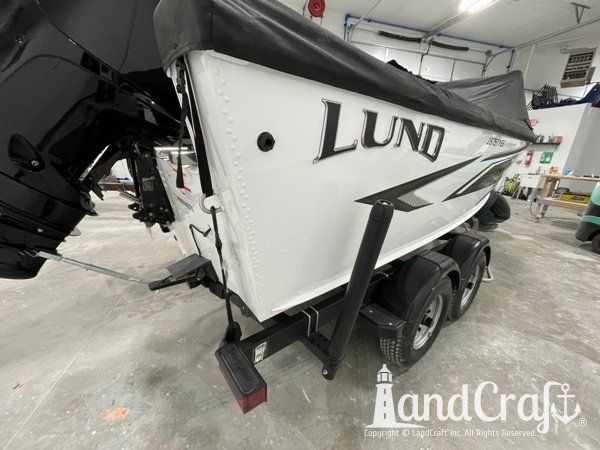 Aluminum Lund boat that has been repaired and refinished