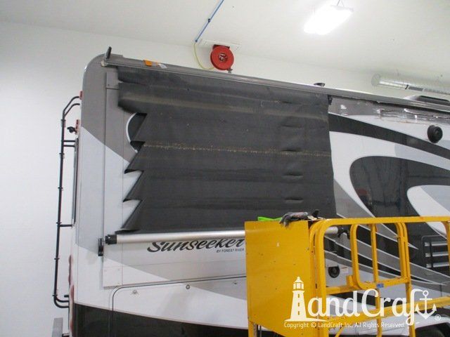 Forest River RV damaged awning due to accident