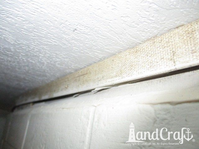 Forest River RV with tear punctured through bathroom wall due to an accident