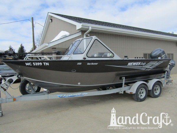 Picture of the repaired and refinished aluminum Hewescraft boat